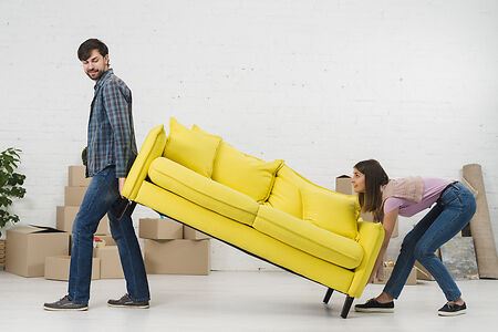 Couple moving their Ikea couch
