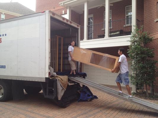 Our Experience crew Loading the Truck