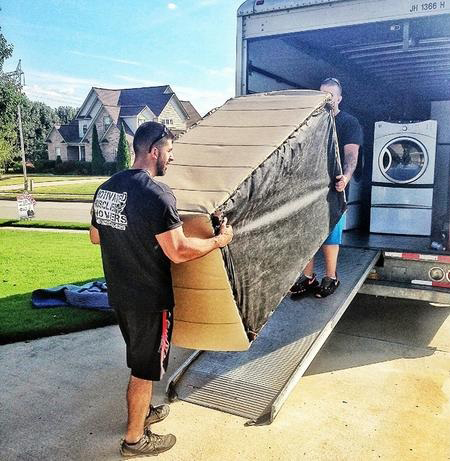 {Muscled Up Movers }
