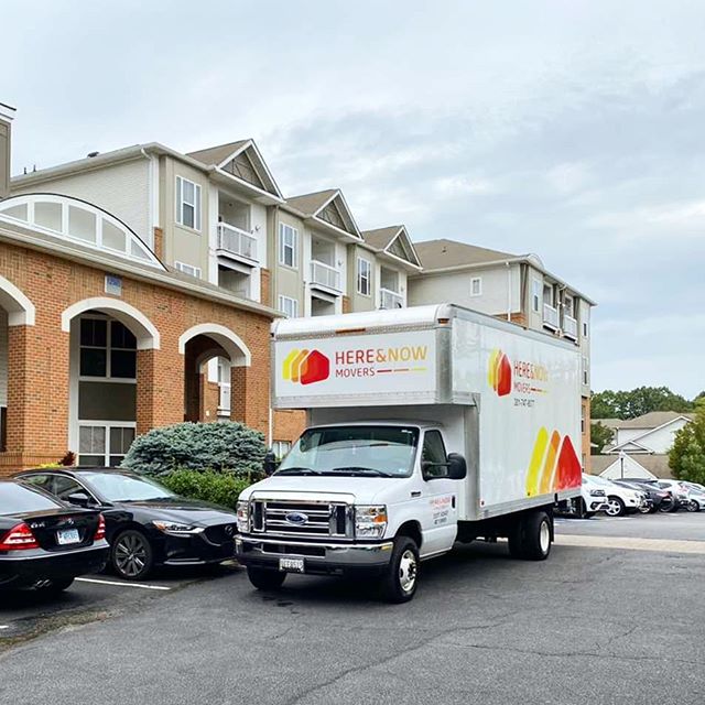 Truck with logo at apartment complex