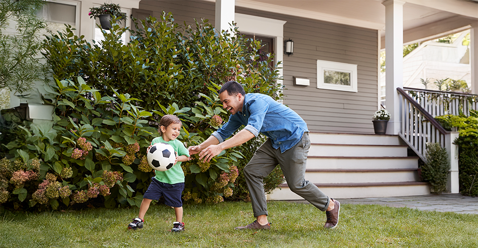 Adult ensuring child safety during outdoor activities