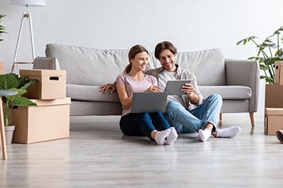 couple posting on social media about moving